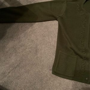 I am selling a green cardigan or is really new it has only been worn a few times